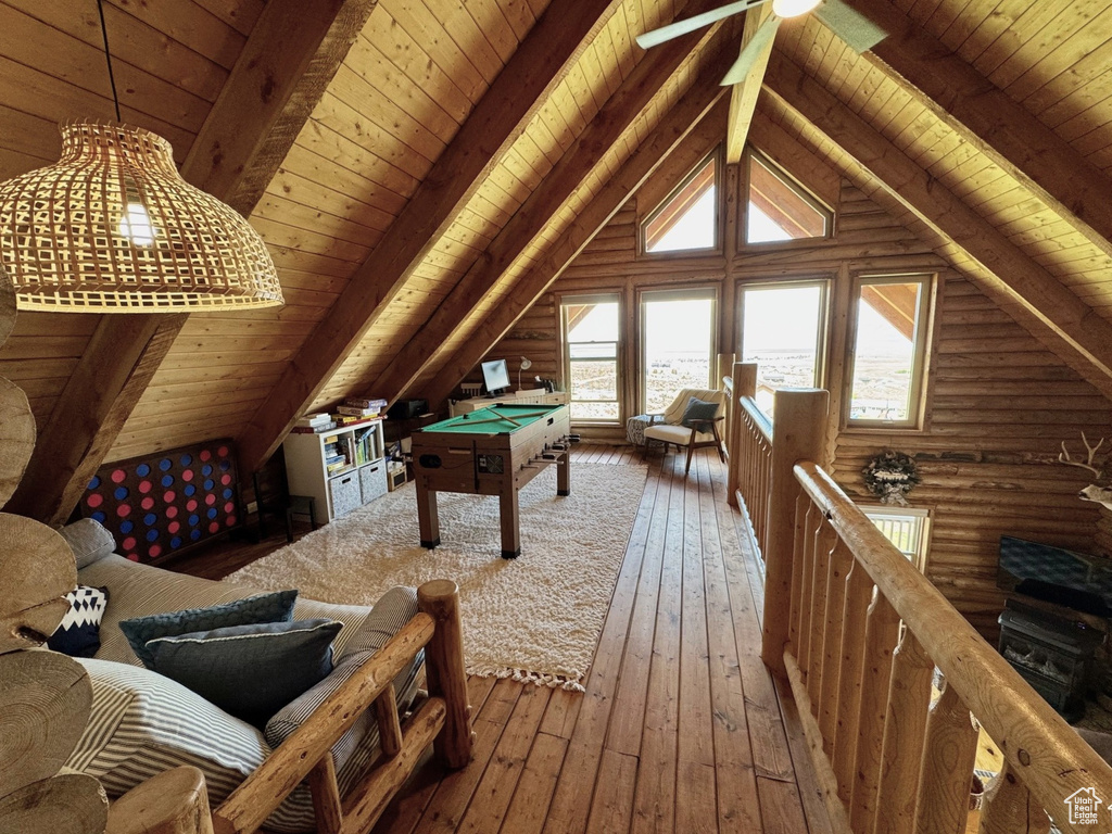 Rec room with wooden ceiling, hardwood / wood-style flooring, pool table, and rustic walls