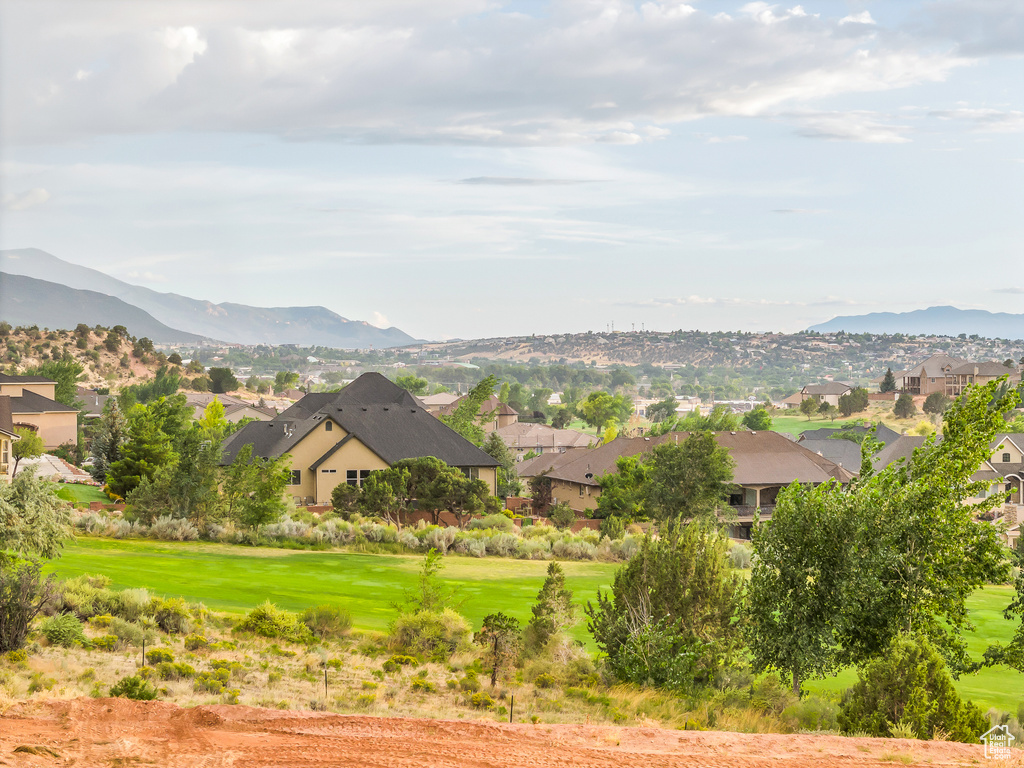 View of mountain backdrop with nearby suburban area