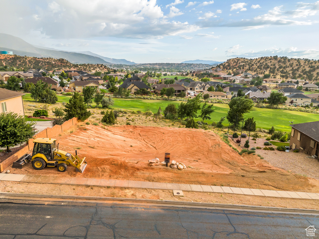 View of mountain background featuring nearby suburban area