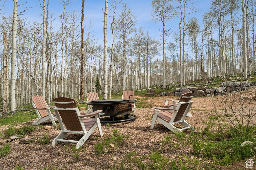 View of yard featuring a fire pit