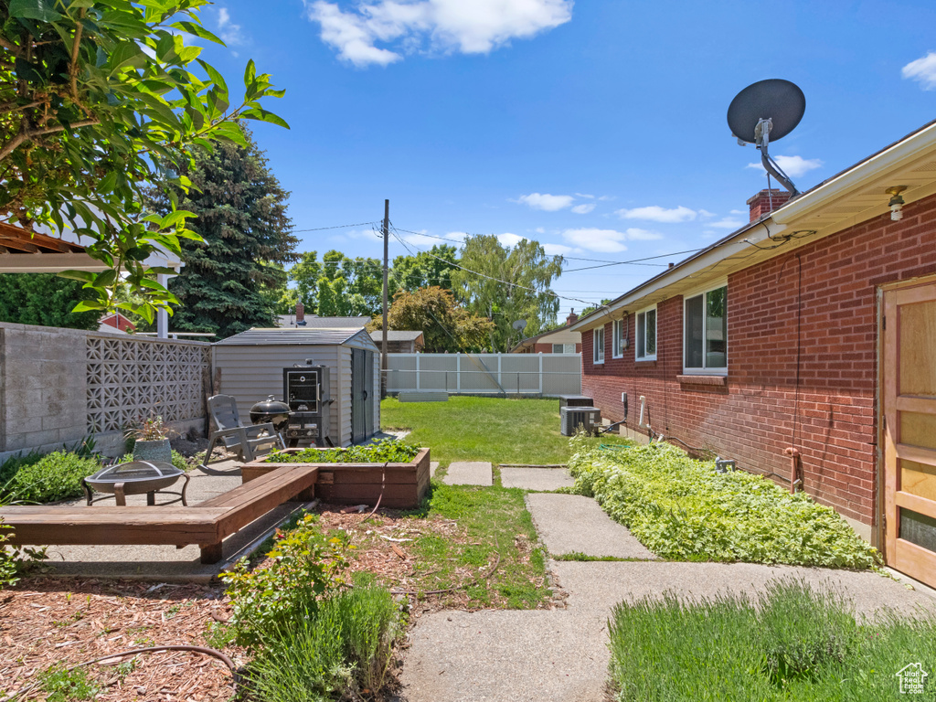 View of yard featuring central AC