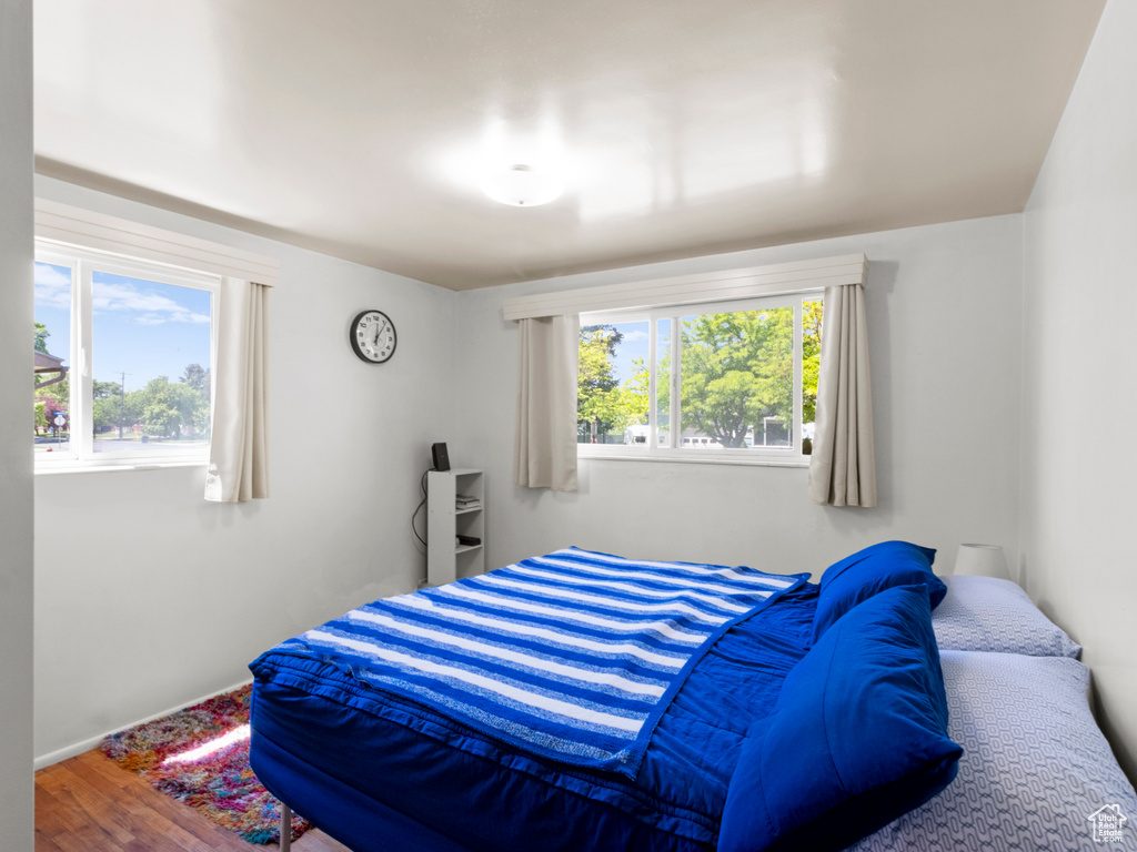 Bedroom with wood finished floors