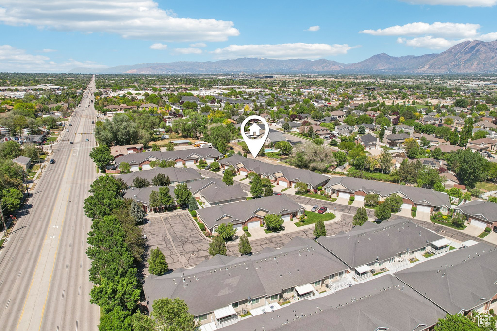 Aerial perspective of suburban area featuring mountains