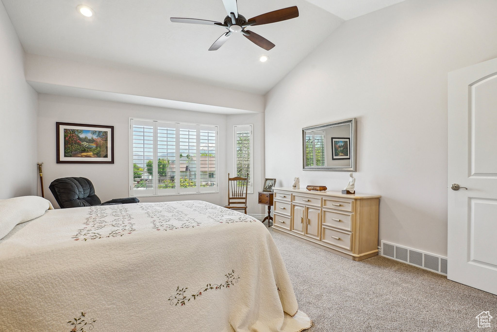 Bedroom featuring light carpet, recessed lighting, ceiling fan, and high vaulted ceiling