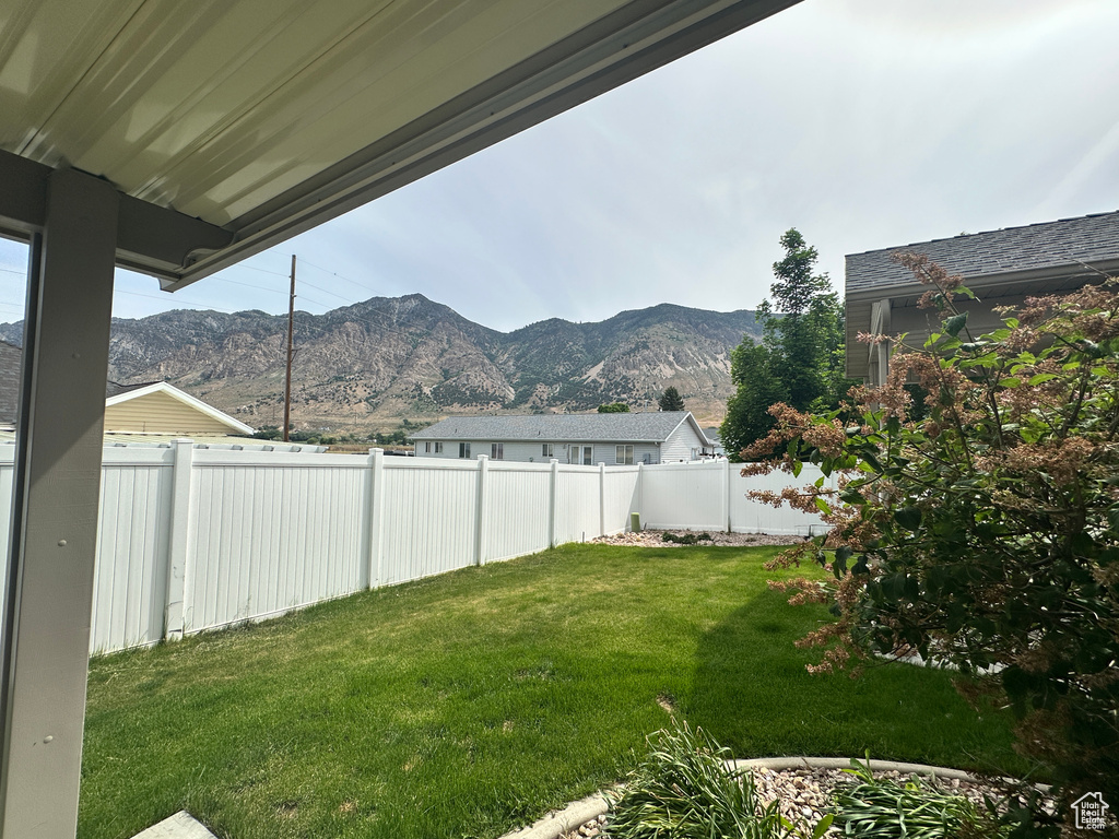 View of yard with a mountain view