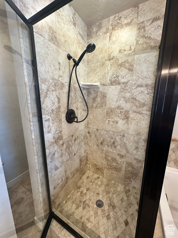 Bathroom with a shower stall