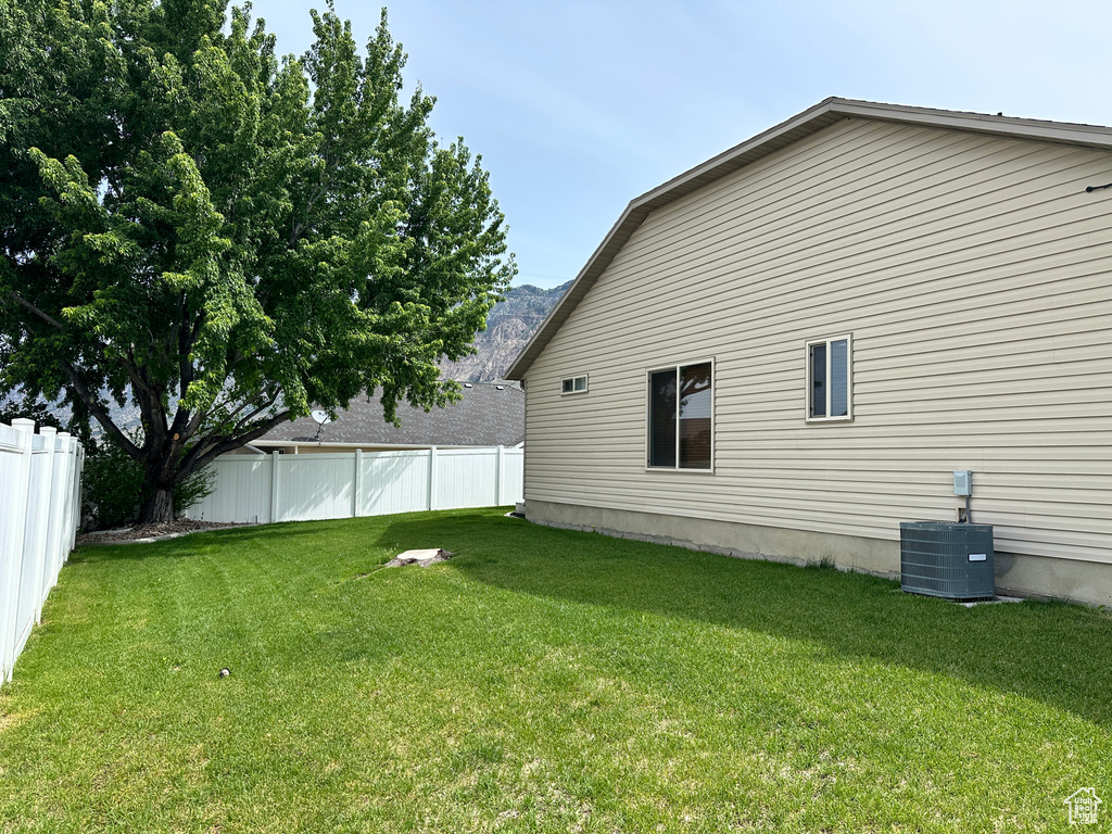 View of yard featuring cooling unit