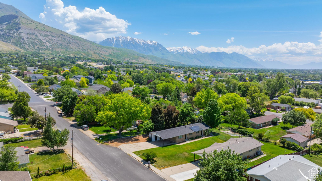 Aerial view of residential area with a mountainous background