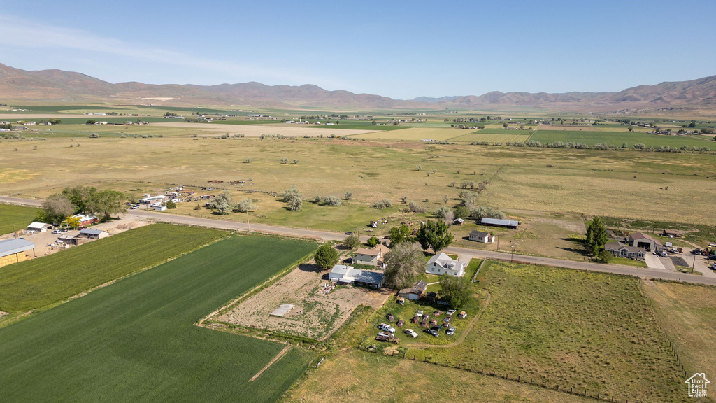 Aerial view of property's location featuring rural landscape and mountains