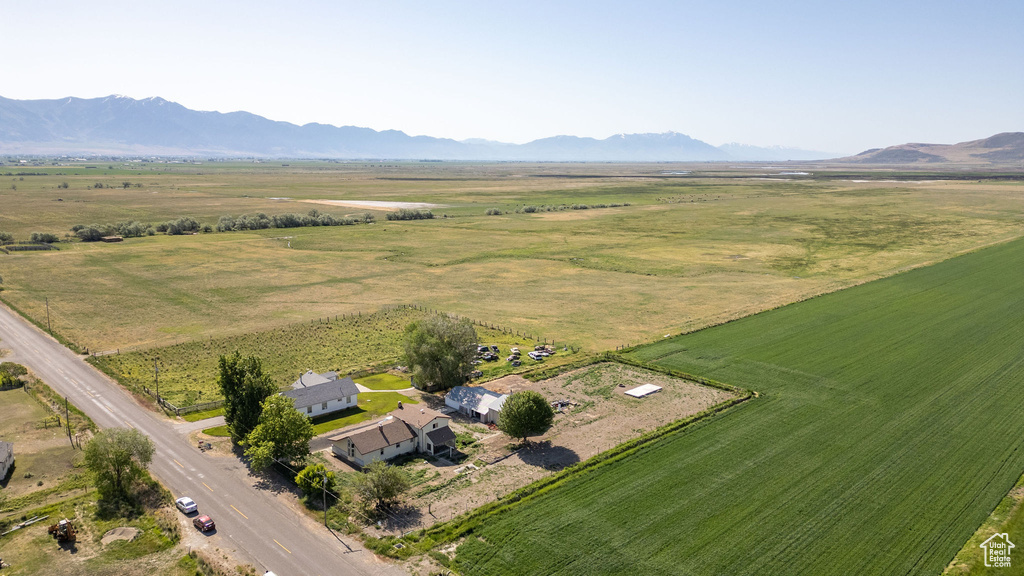 Aerial view of sparsely populated area featuring a mountainous background