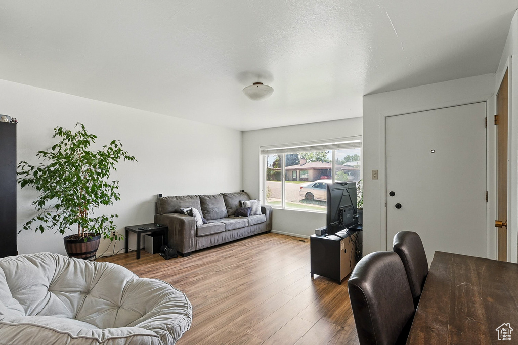 Living area featuring wood finished floors
