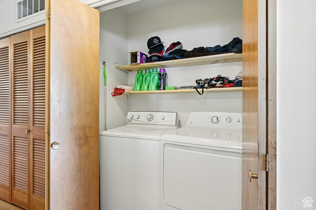Laundry area with separate washer and dryer