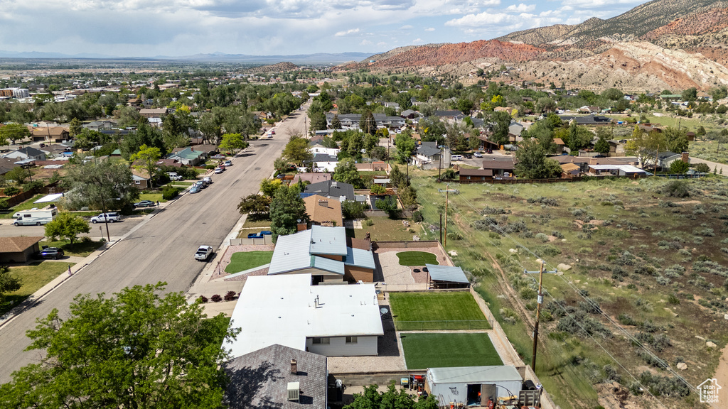 Aerial view of residential area featuring mountains