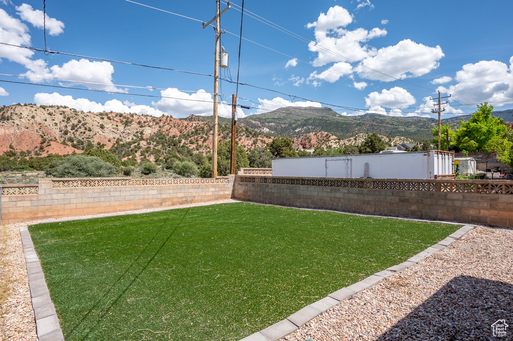 View of yard with a mountain view