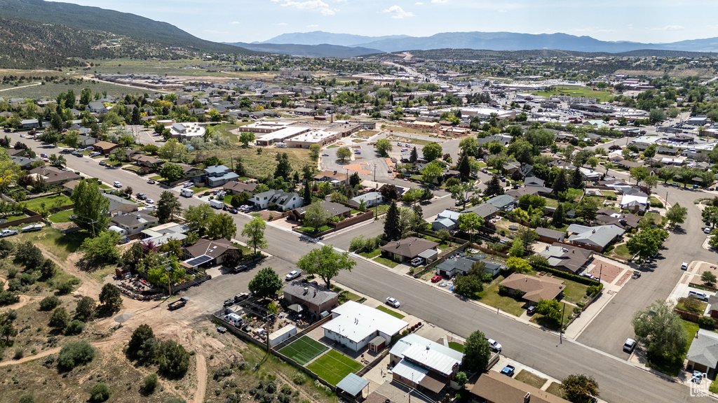 Aerial overview of property's location with a mountain backdrop