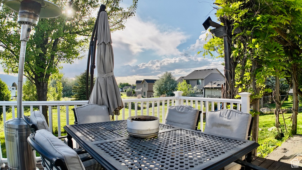 Wooden terrace featuring outdoor dining space