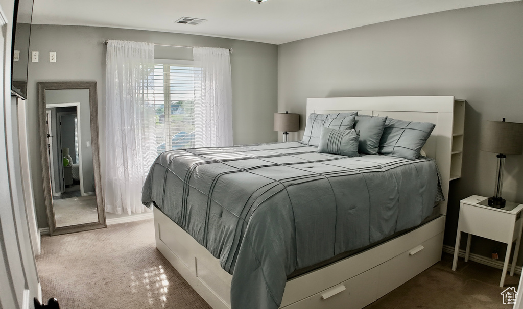 Bedroom featuring carpet