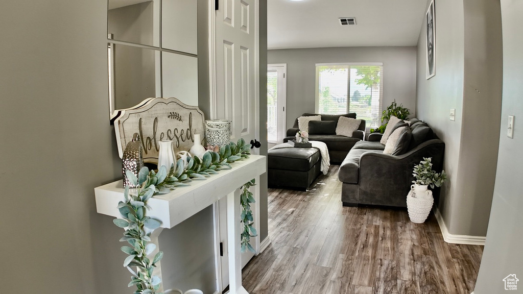 Living room featuring wood finished floors and baseboards