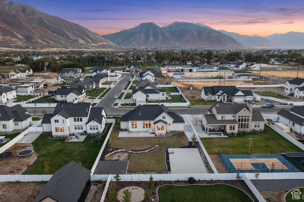 Aerial view at dusk of a mountain view and a residential view