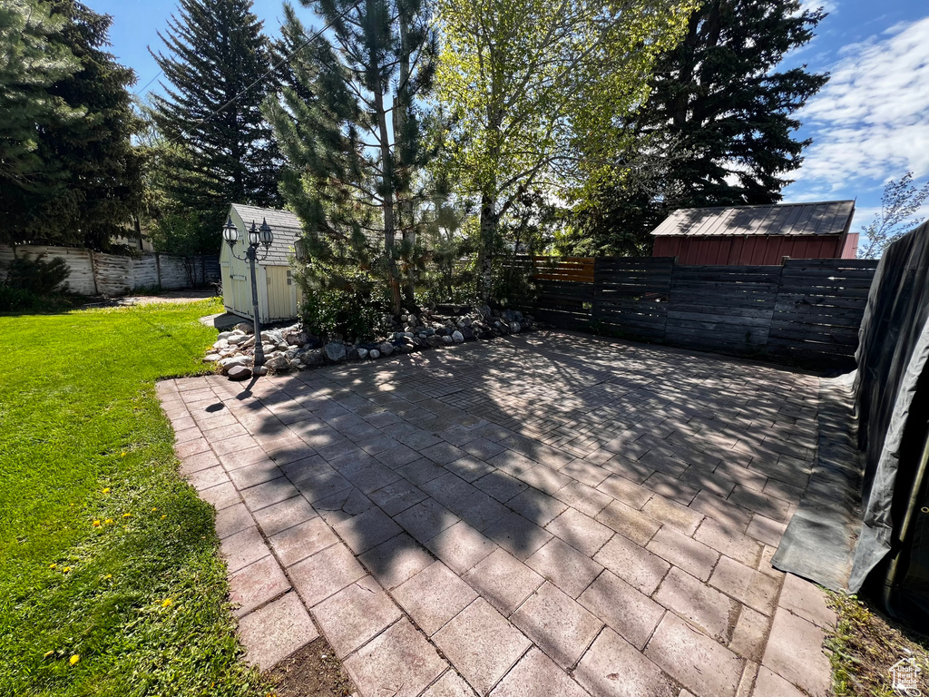 Wooden deck with a patio
