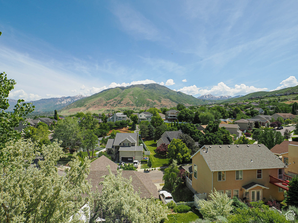View of mountain background featuring nearby suburban area