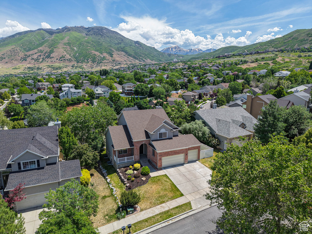 Aerial perspective of suburban area featuring mountains