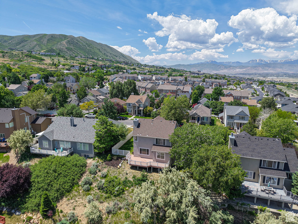 Aerial view of residential area with a mountainous background