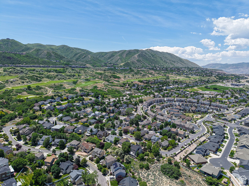 Aerial view of residential area with a mountain backdrop