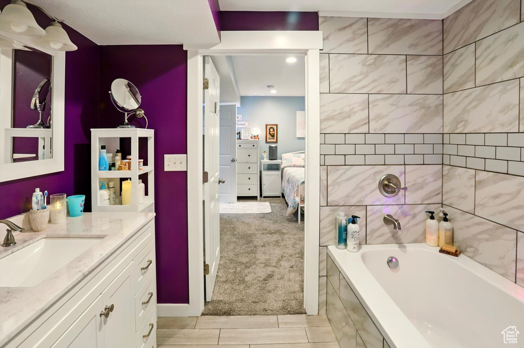 Ensuite bathroom featuring vanity
