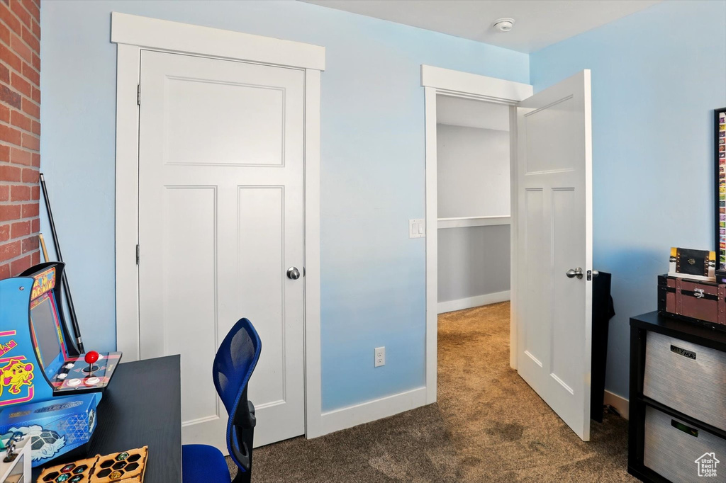 Office featuring carpet and baseboards
