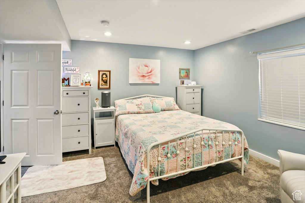 Bedroom featuring carpet, baseboards, and recessed lighting
