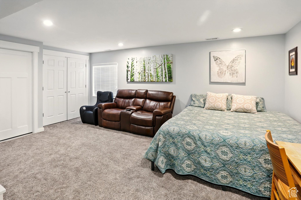 Carpeted bedroom featuring recessed lighting