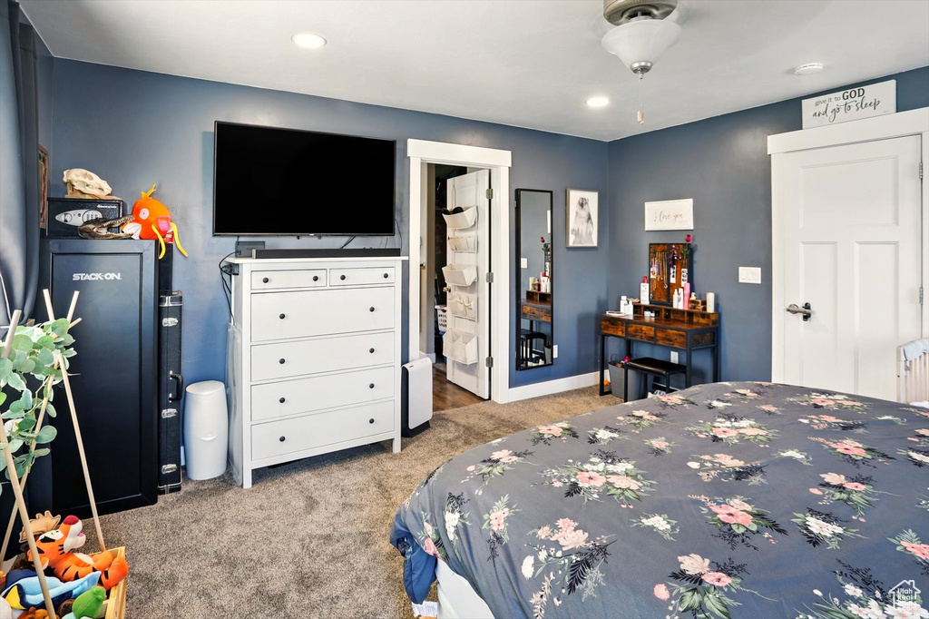 Carpeted bedroom featuring baseboards and recessed lighting