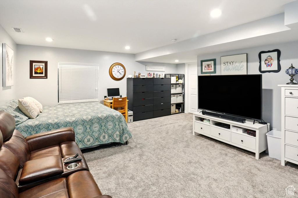 Bedroom featuring carpet flooring and recessed lighting