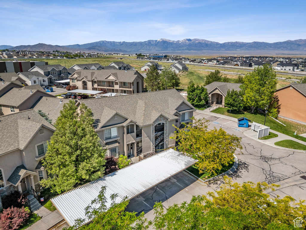 Aerial view of residential area featuring mountains