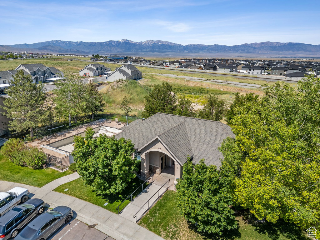 Aerial perspective of suburban area featuring mountains