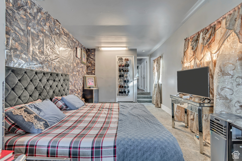 Bedroom featuring carpet