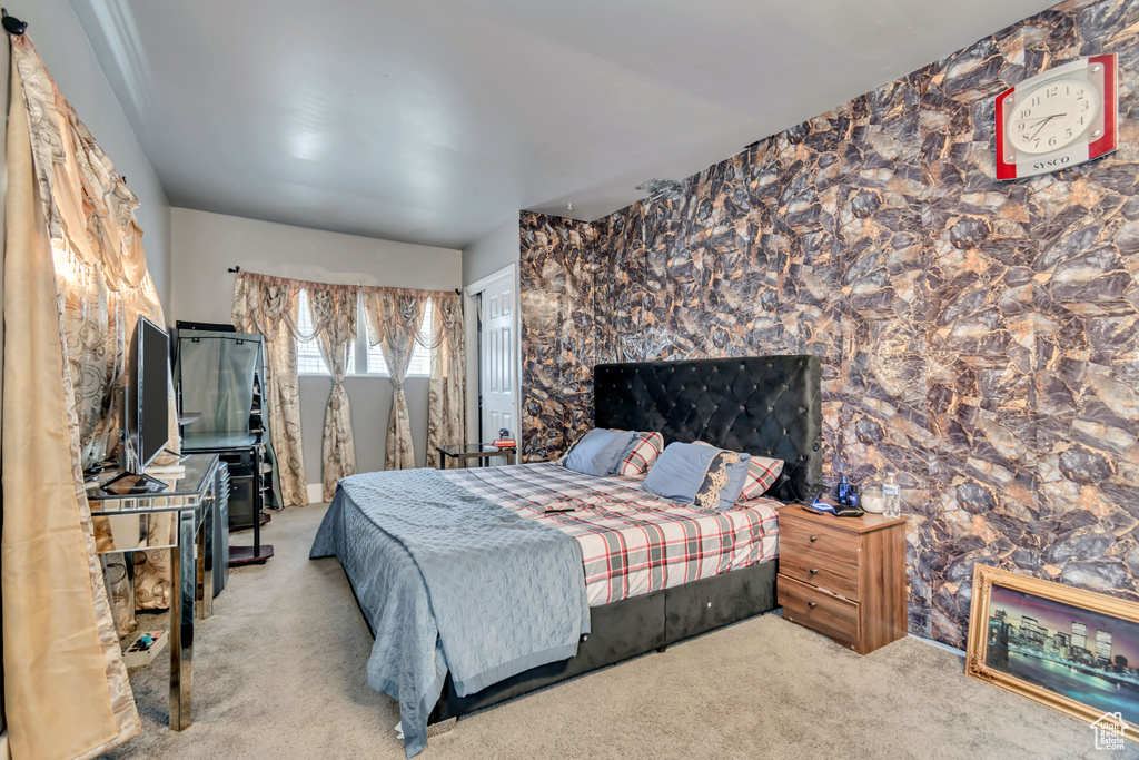 Bedroom featuring carpet floors