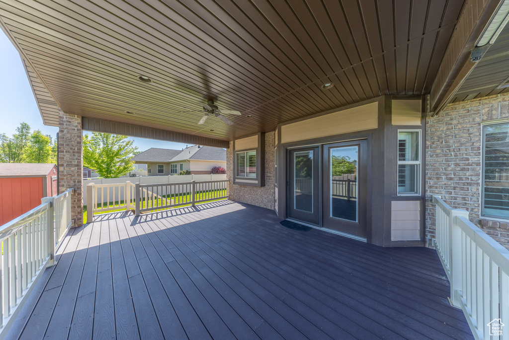 Wooden terrace with ceiling fan