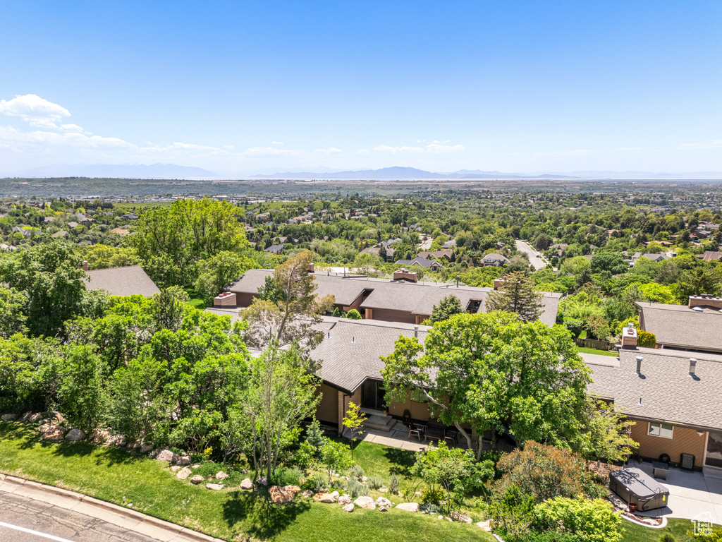 Aerial view of residential area with mountains