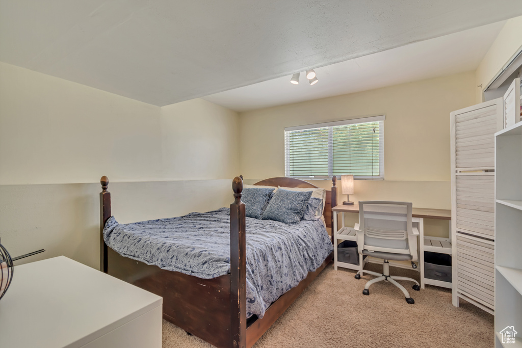 Bedroom featuring carpet floors