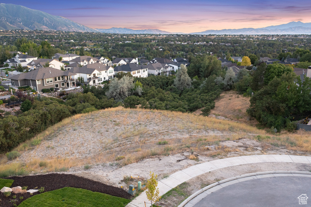Aerial view at dusk of a mountain view and a residential view