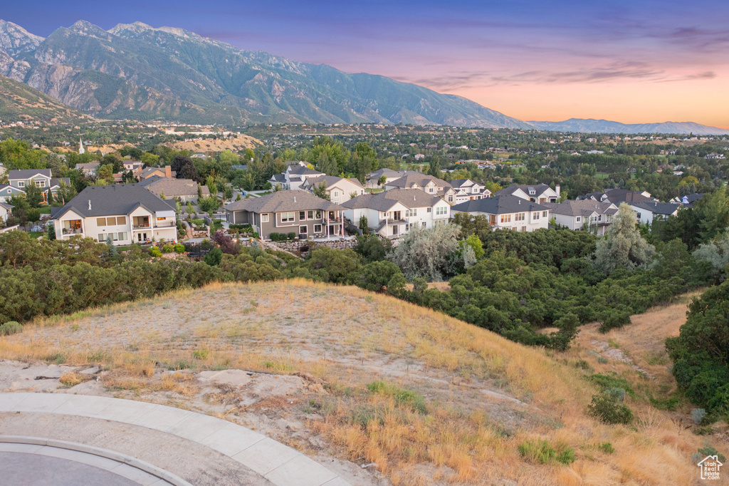 View of mountain background featuring nearby suburban area