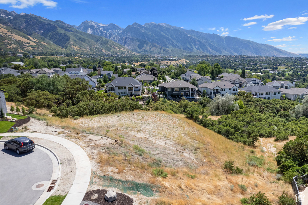 View of mountain backdrop with nearby suburban area