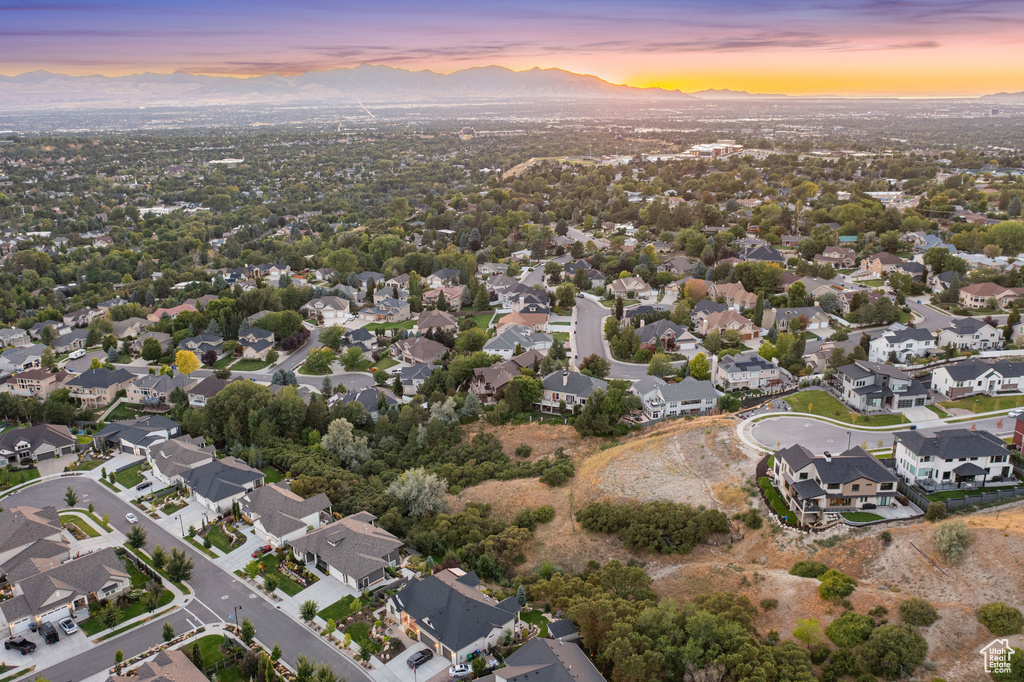 Aerial view at dusk of a mountain view and a residential view