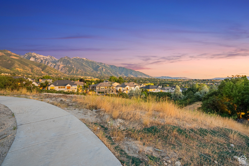View of mountain backdrop with nearby suburban area