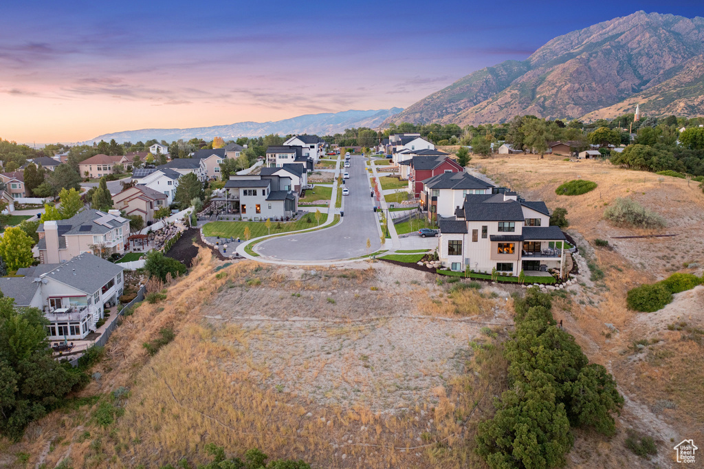 Aerial view at dusk of a mountain view and a residential view