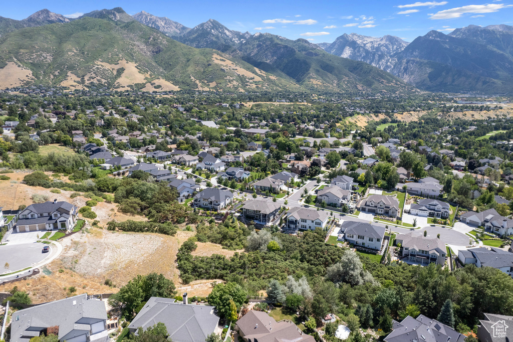 Aerial view of residential area with a mountain backdrop