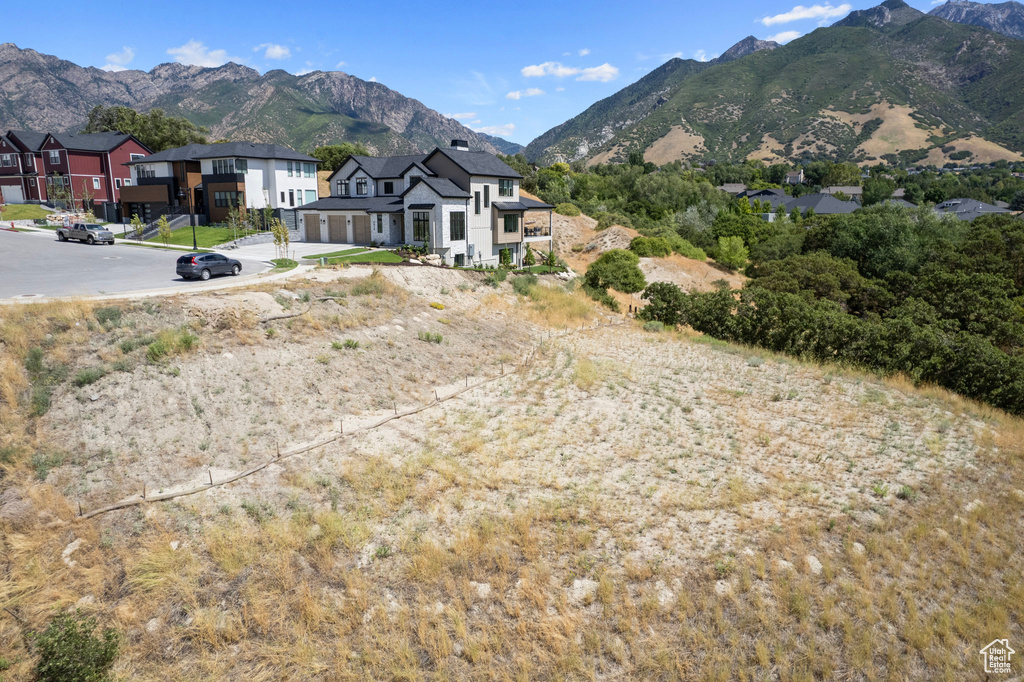 View of mountain backdrop with nearby suburban area