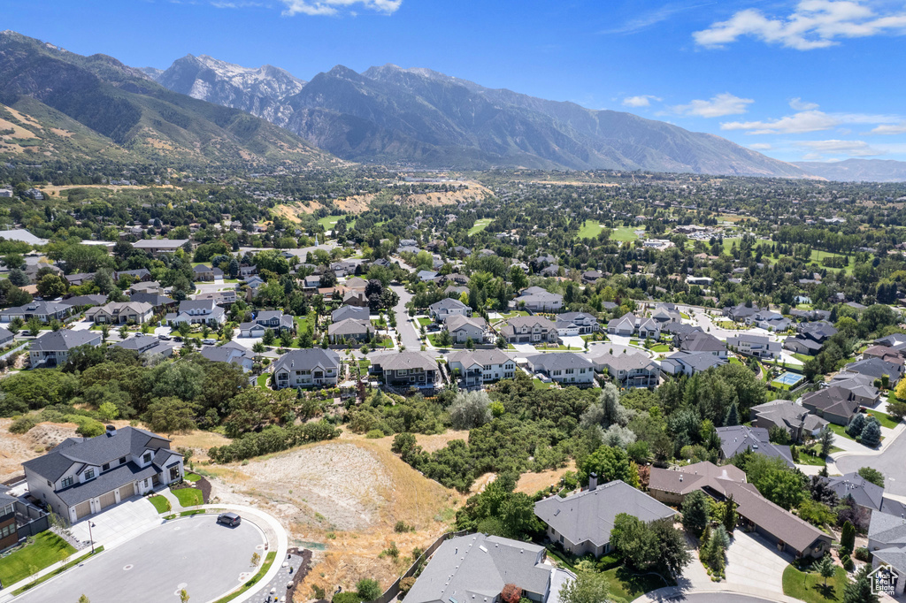 Aerial view of residential area with a mountain backdrop